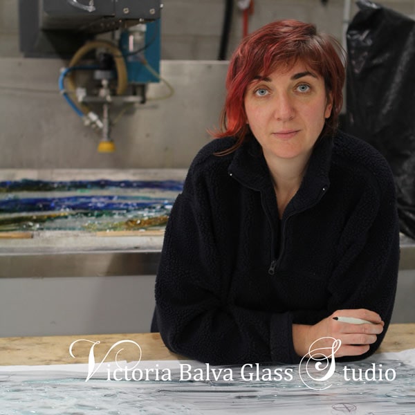 Architectural glass artist Victoria Balva in her glass studio in Toronto