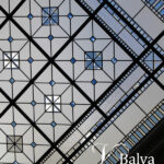 Beveled stained and leaded glass skylight ceiling with clear and blue bevellled glass in classic geometric simple design for a luxury custom built residence