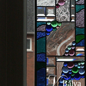 Contemporary abstract stained and leaded glass panels with glass nuggets and bevelled glass