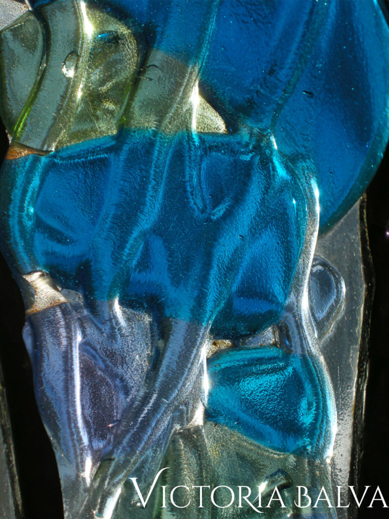 Fused glass rocks with clear fused texture close up