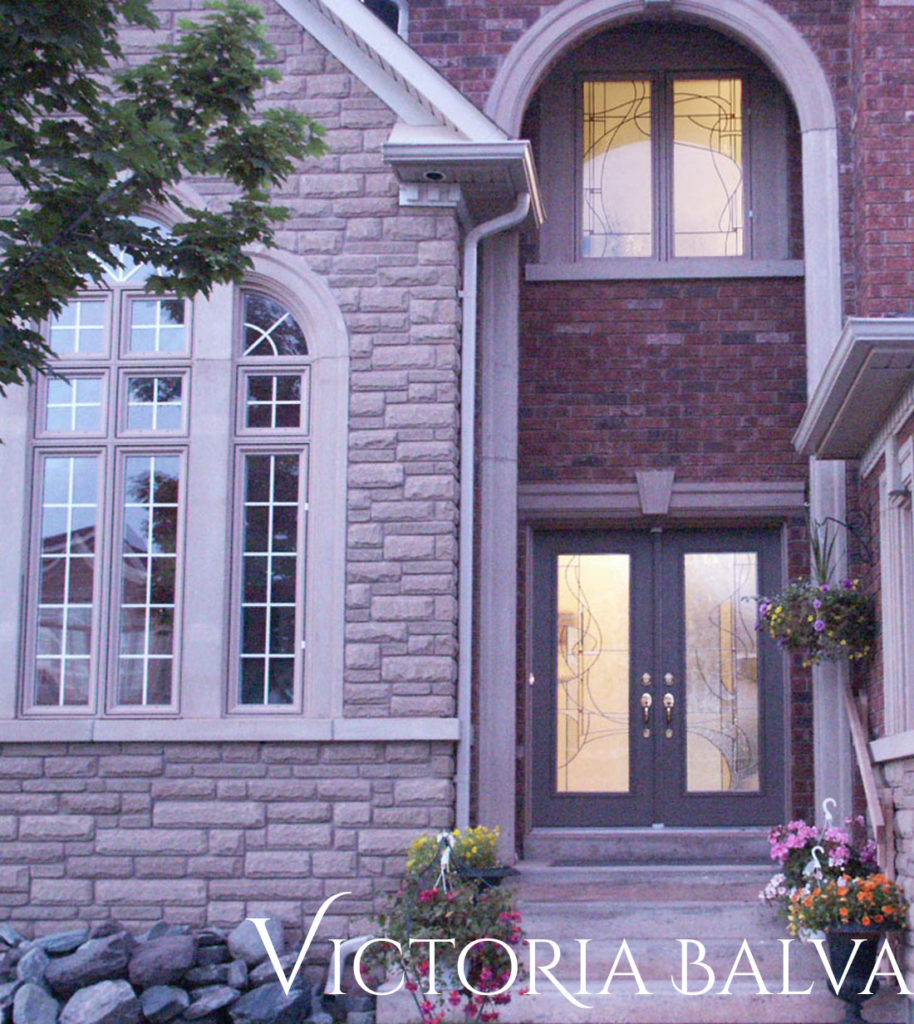 Front entrance with double door insert and transom window for a luxury residence in Oakville