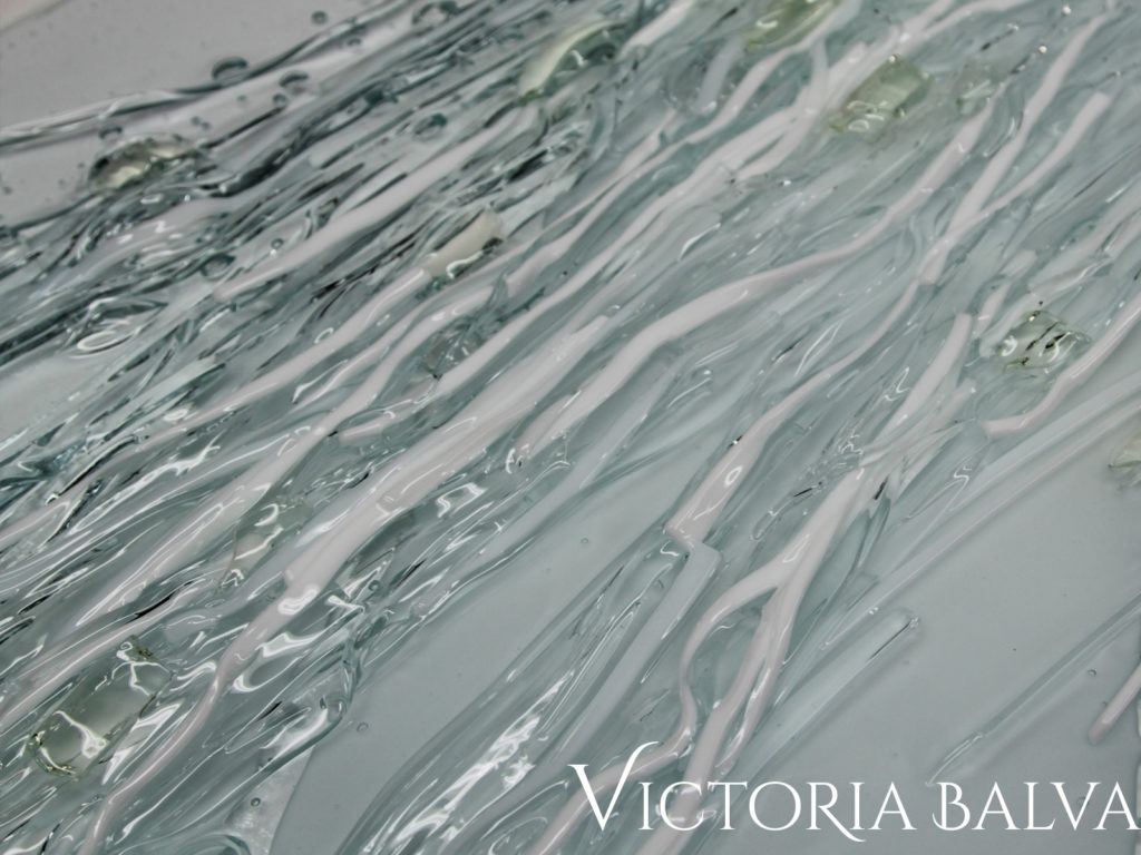 Dramatic textured white and clear glass art texture