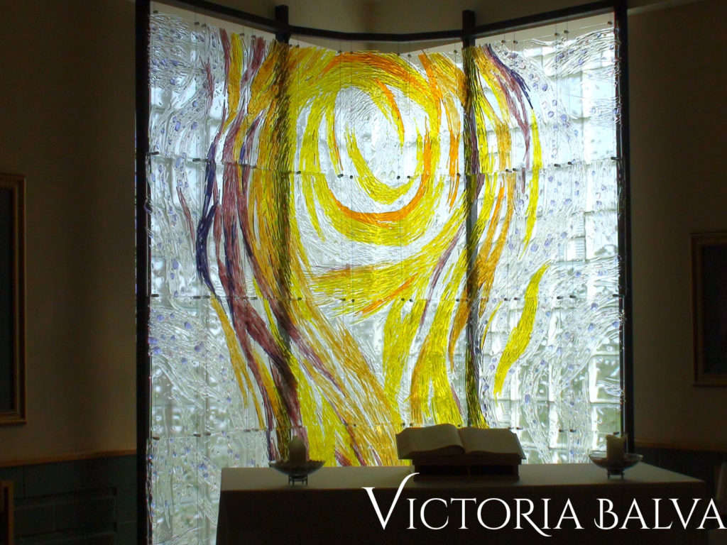 Dramatic kiln-cast art glass mural at a catholic school in Mississauga