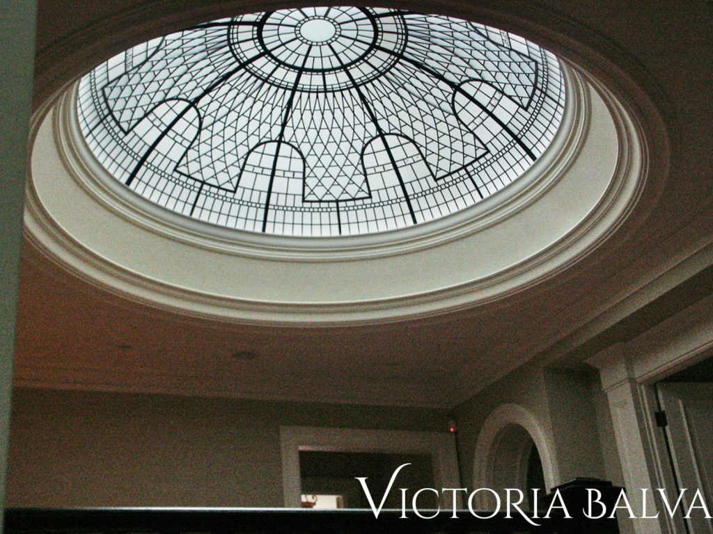 Stained and leaded glass dome ceiling with crown moldings for a custom built residence in Toronto