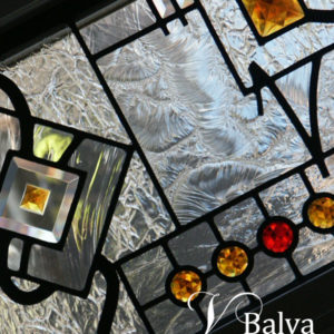 Abstract modern stained glass window transoms with amber and red stained glass jewels for a living room of a custom built residence in Forest Hill Toronto