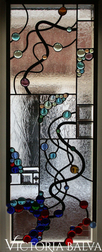 Modern stained and leaded glass hanging panel for the dining room inspired by spiral wires chandelier