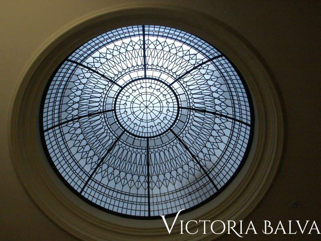 Residential stained glass dome illuminated by a daytime with clear textured glass, Spectrum Granite and bevelled glass