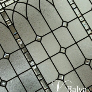 Classic stained and leaded glass window with bevelled glass for a stair landing of a custom built residence in Toronto